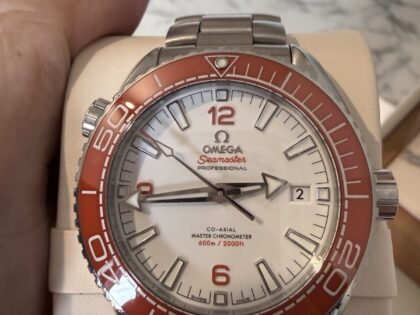 Omega Seamaster Planet Ocean 44 mm Orange 21530442104001 Garantie